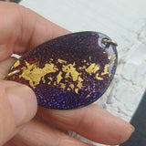 Enamelled purple pendant with gold leaf