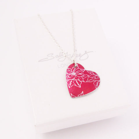 Red aluminum Poinsettia motif Pendant by Sally Lees - December's Birth Flower