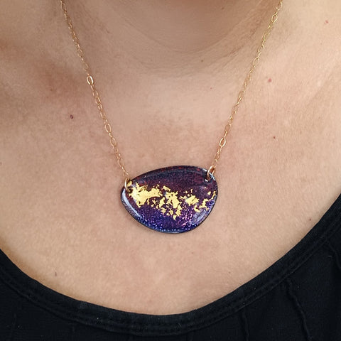 Enamelled purple pendant with gold leaf