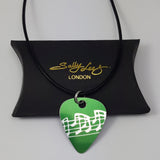Green guitar pick pendant  with musical notes pattern hand made by Sally Lees
