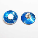 handmade blue aluminium earrings printed with iris motifs with siver stud centres