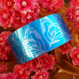 Blue Bitterflies aluminium cuff by Sally Lees
