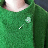 Green 'New Dawn' suffragette scroll stud aluminum and silver pin on coat lapel