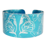 light blue aluminium cuff with butterflies